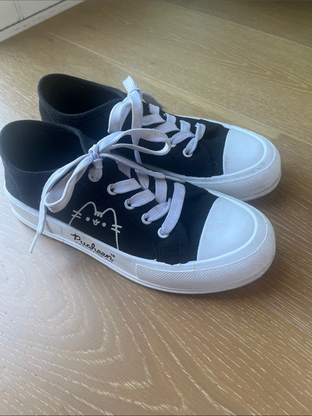 Black Kids Pusheen Canvas Sneakers with White Accents and Cat Graphic